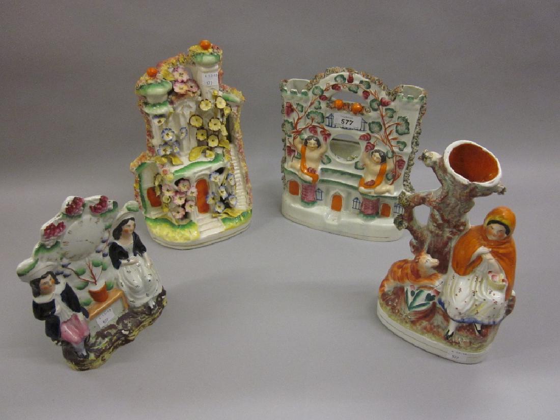 19th Century Staffordshire watch holder group, babes in (1 of 1)