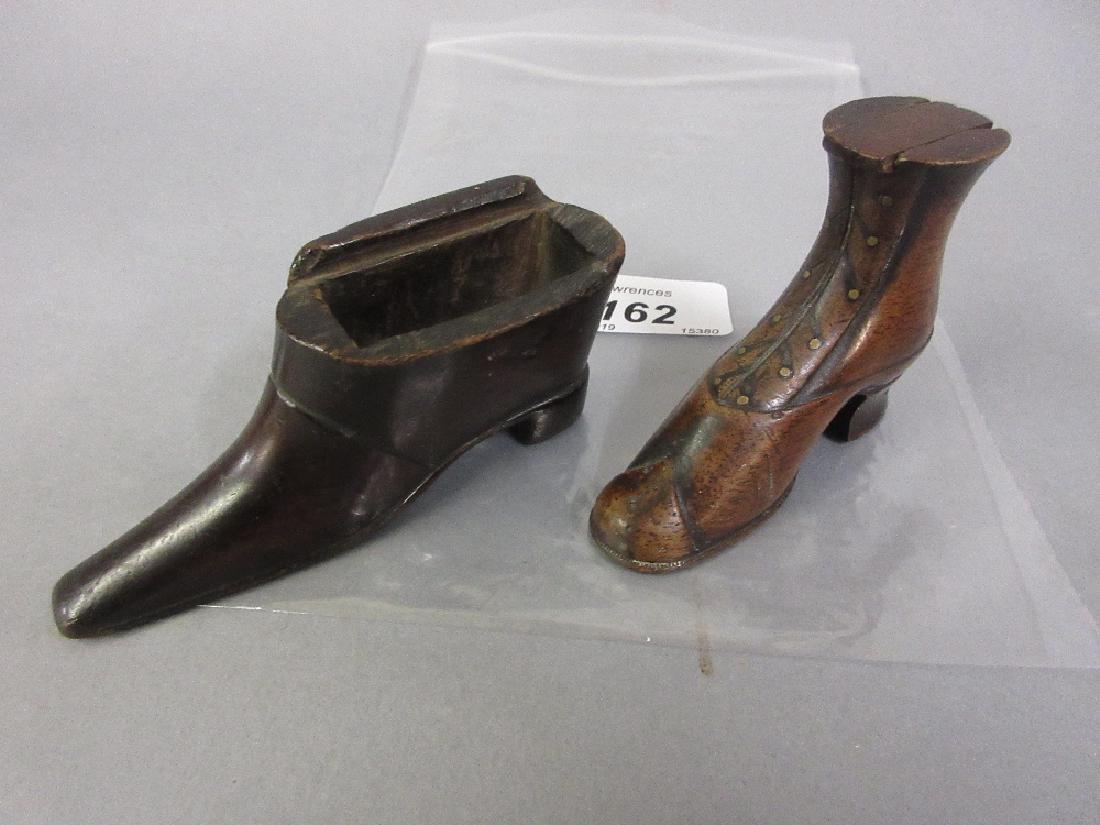19th Century mahogany snuff shoe with protruding heel: 19th Century mahogany snuff shoe with protruding heel and small sliding cover, together with another 19th Century mahogany snuff shoe lacking cover