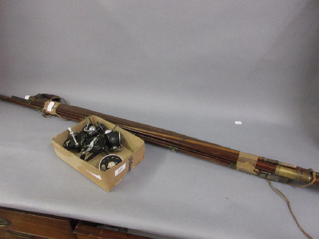 Mitchell 300 fixed spool fishing reel, an Intrepid: Mitchell 300 fixed spool fishing reel, an Intrepid Elite fixed spool fishing reel, an empty spool and various fishing rods