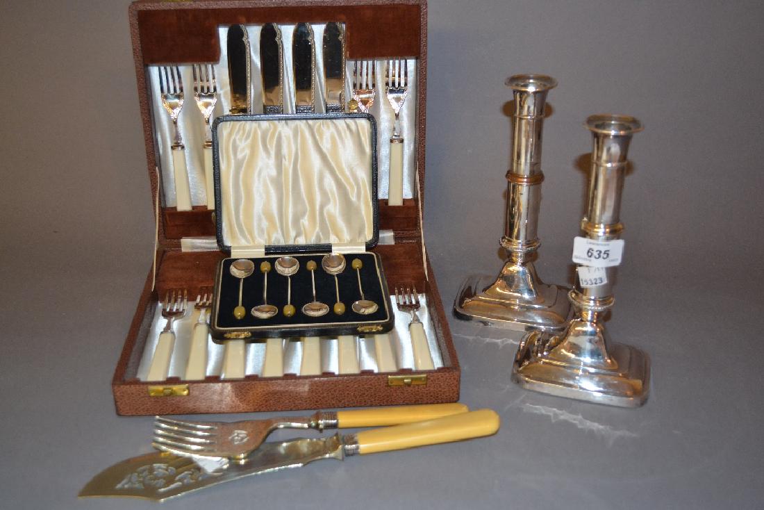 Pair of 19th Century plated on copper telescopic: Pair of 19th Century plated on copper telescopic candlesticks (one as found) together with a cased set of eight plated fish knives and forks, pair of plated fish servers and a cased set of six silver
