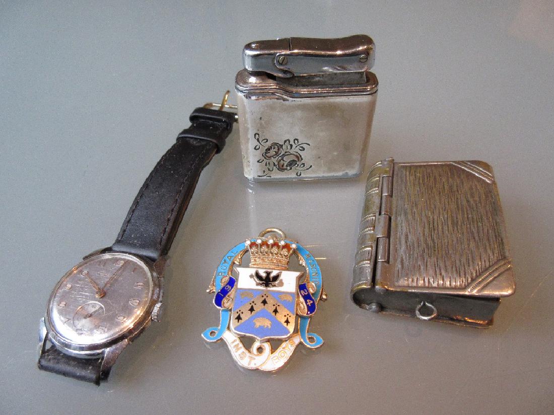 Silver Masonic medal, a Waltham wristwatch, a vesta: Silver Masonic medal, a Waltham wristwatch, a vesta case and a cigarette lighter