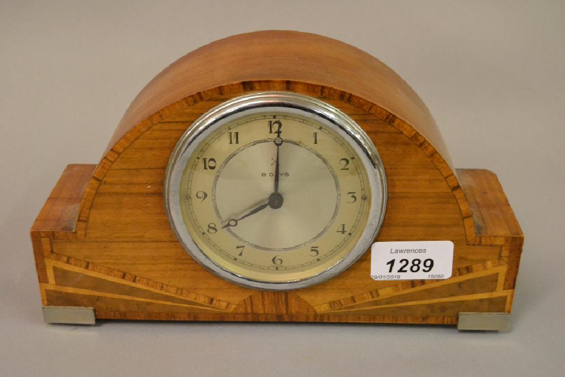 Art Deco walnut and inlaid dome shaped mantel clock: Art Deco walnut and inlaid dome shaped mantel clock together with a 19th Century ebonised mantel clock