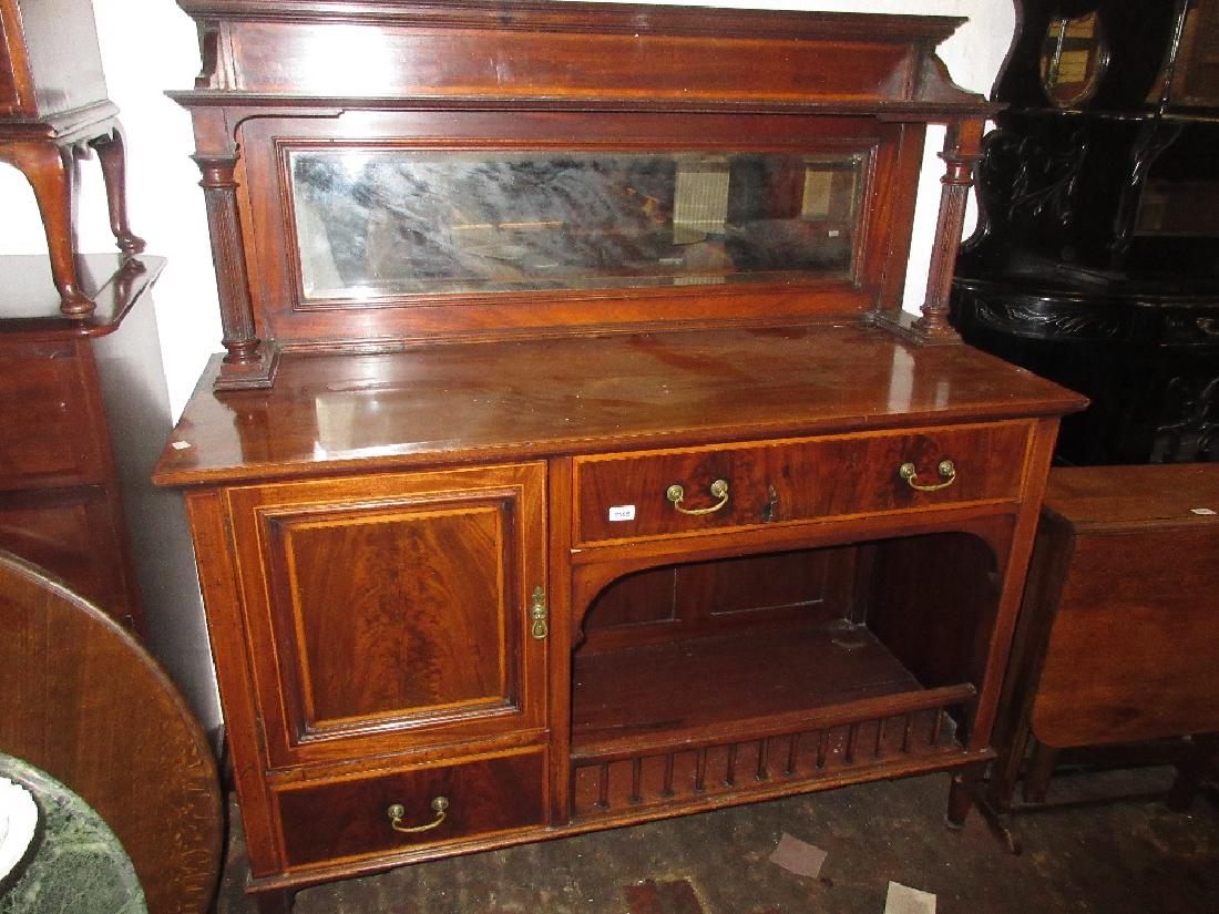 Edwardian mahogany line inlaid and crossbanded: Edwardian mahogany line inlaid and crossbanded sideboard, having galleried mirrored back with turned pilasters
