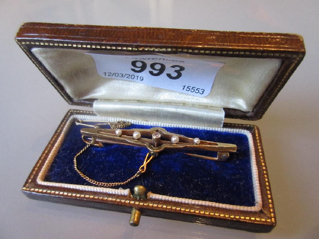 9ct Yellow gold diamond and split seed pearl set bar: 9ct Yellow gold diamond and split seed pearl set bar brooch, in original box