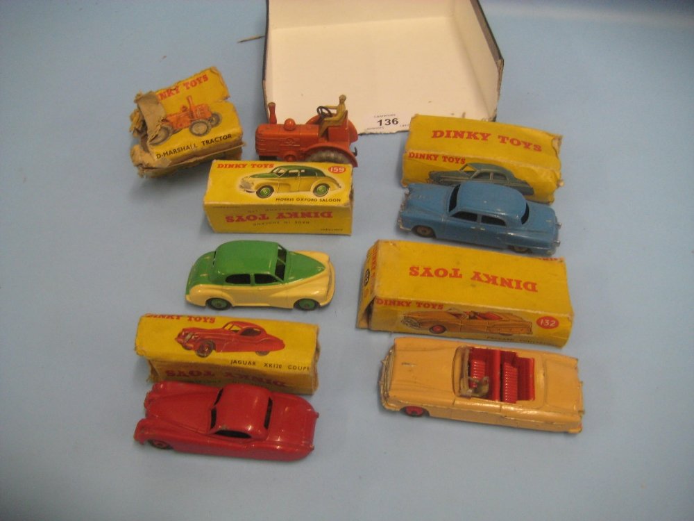 Four various boxed Dinky die-cast metal model cars, (1 of 1)