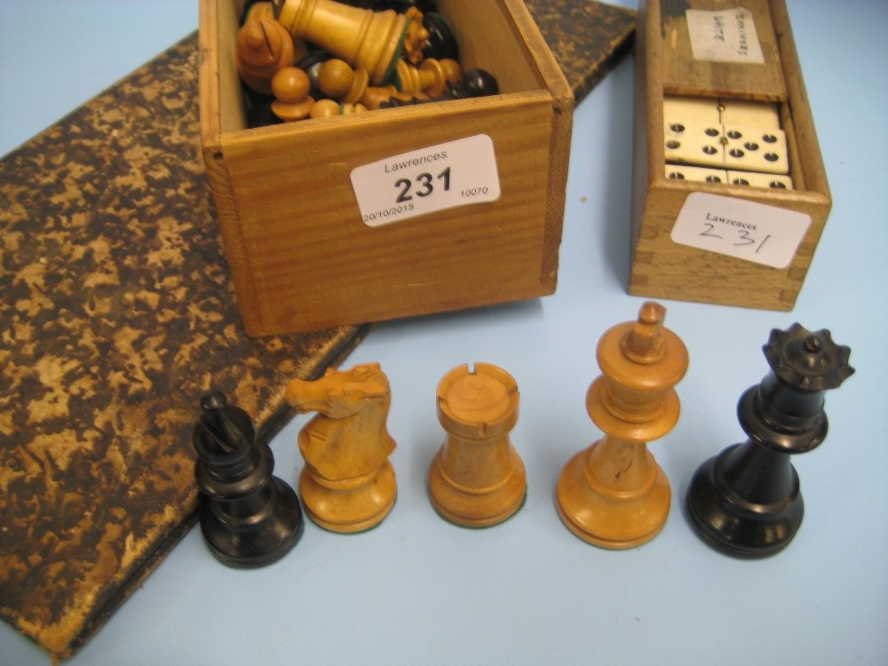 Boxed ebony and boxwood chess set with an embossed (1 of 1)