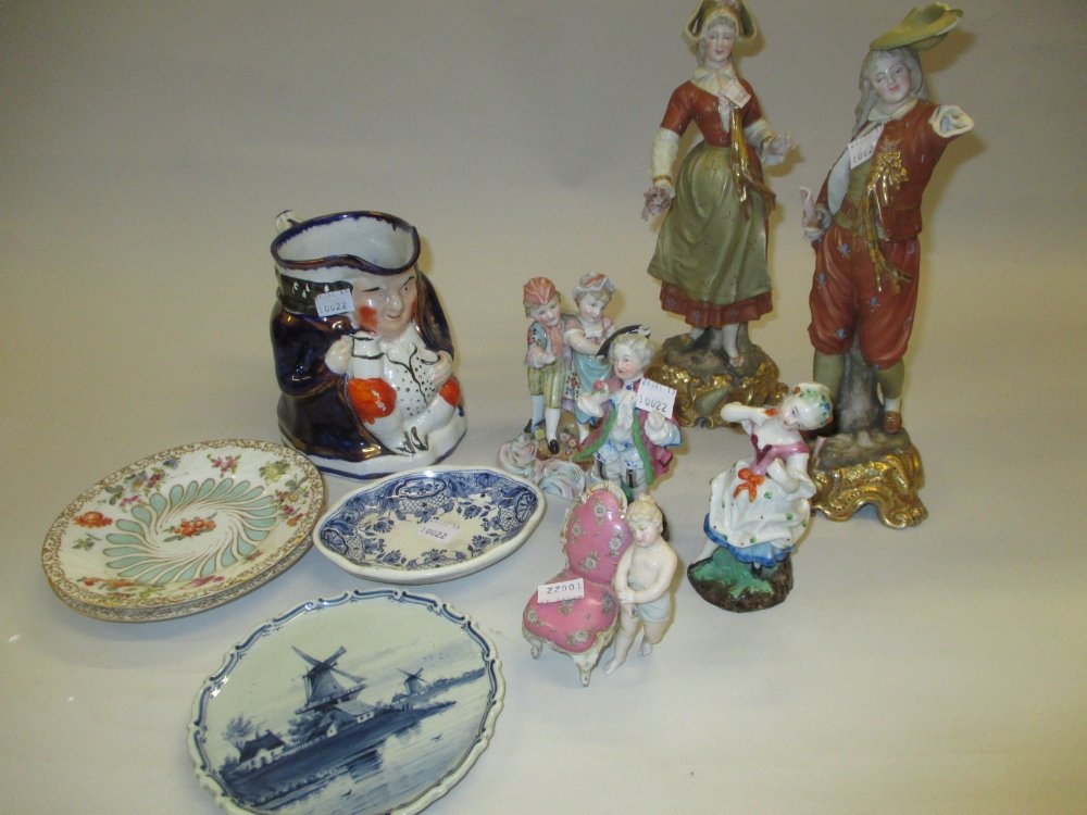 Pair of Continental porcelain figures of a lady and (1 of 1)