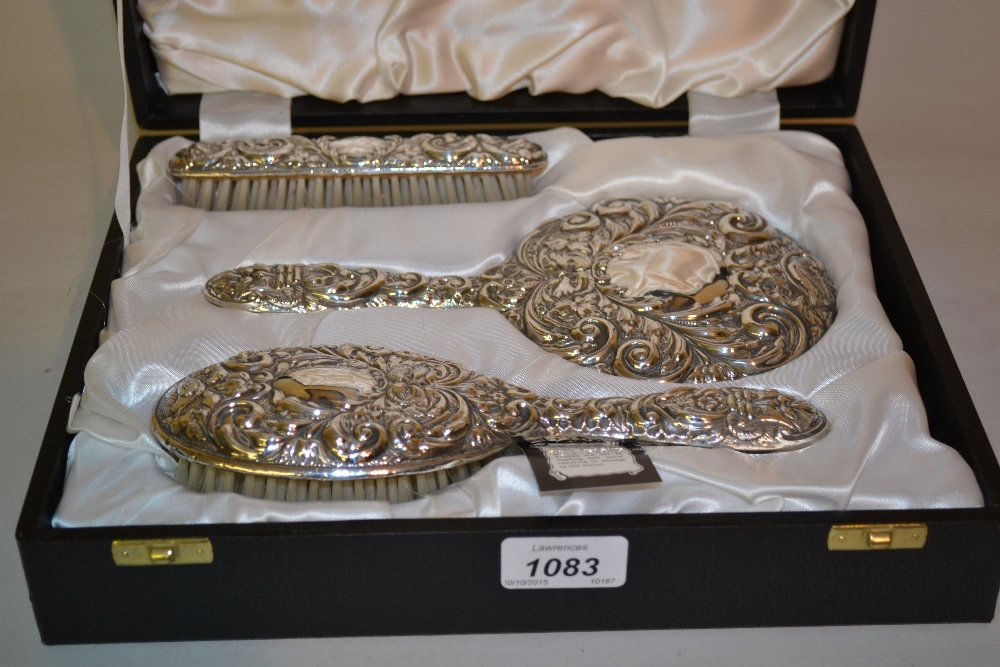 Late 20th Century silver floral embossed three piece (1 of 1)