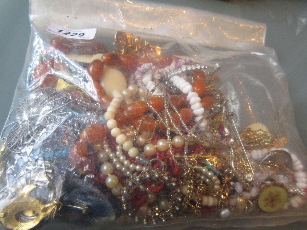Bag containing a quantity of various costume jewellery (1 of 1)