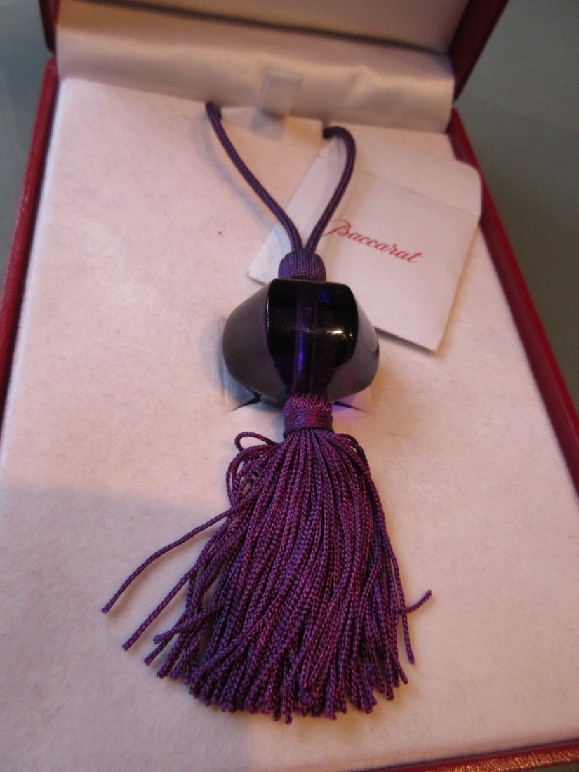 Baccarat mauve glass pendant on matching cord in (1 of 2)