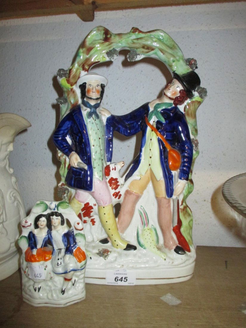 Staffordshire pottery group of two gentlemen and a dog, (1 of 1)