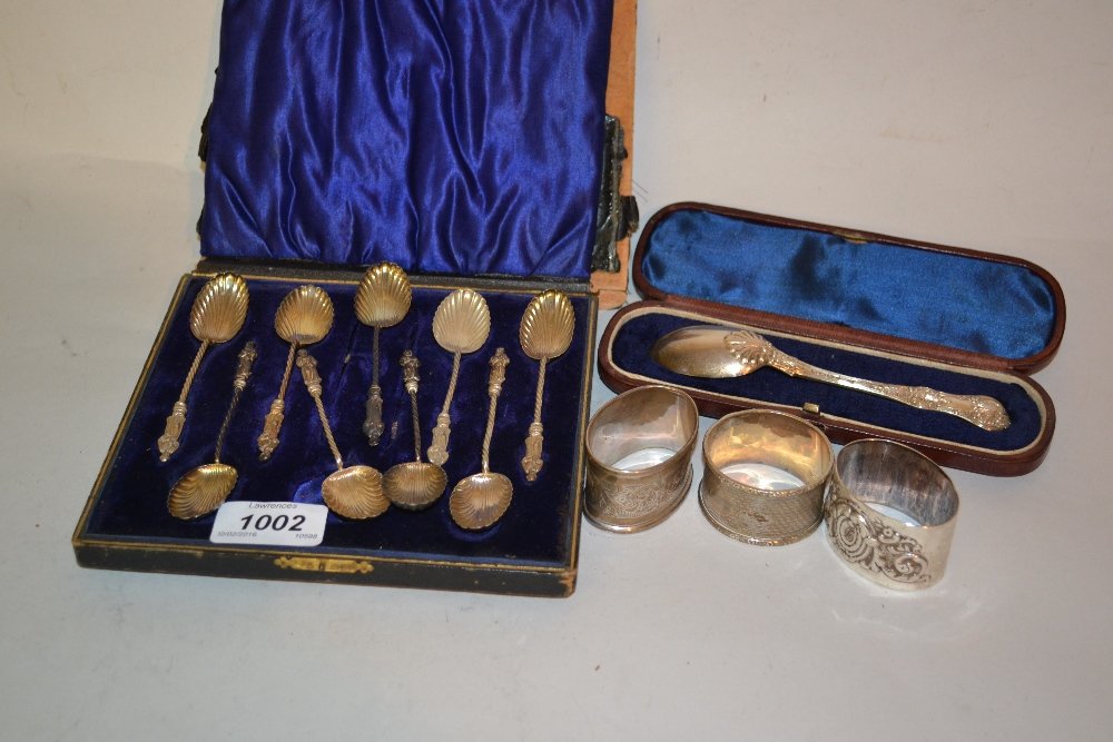 Quantity of silver Apostle teaspoons, cased silver: Quantity of silver Apostle teaspoons, cased silver preserve spoon, silver cased pocket watch (a/f) and three various silver napkin rings