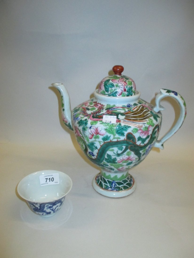Small Chinese porcelain bowl decorated in blue and: Small Chinese porcelain bowl decorated in blue and white with dragons, four character mark to base, 3.5ins diameter together with a Canton teapot (a/f)
