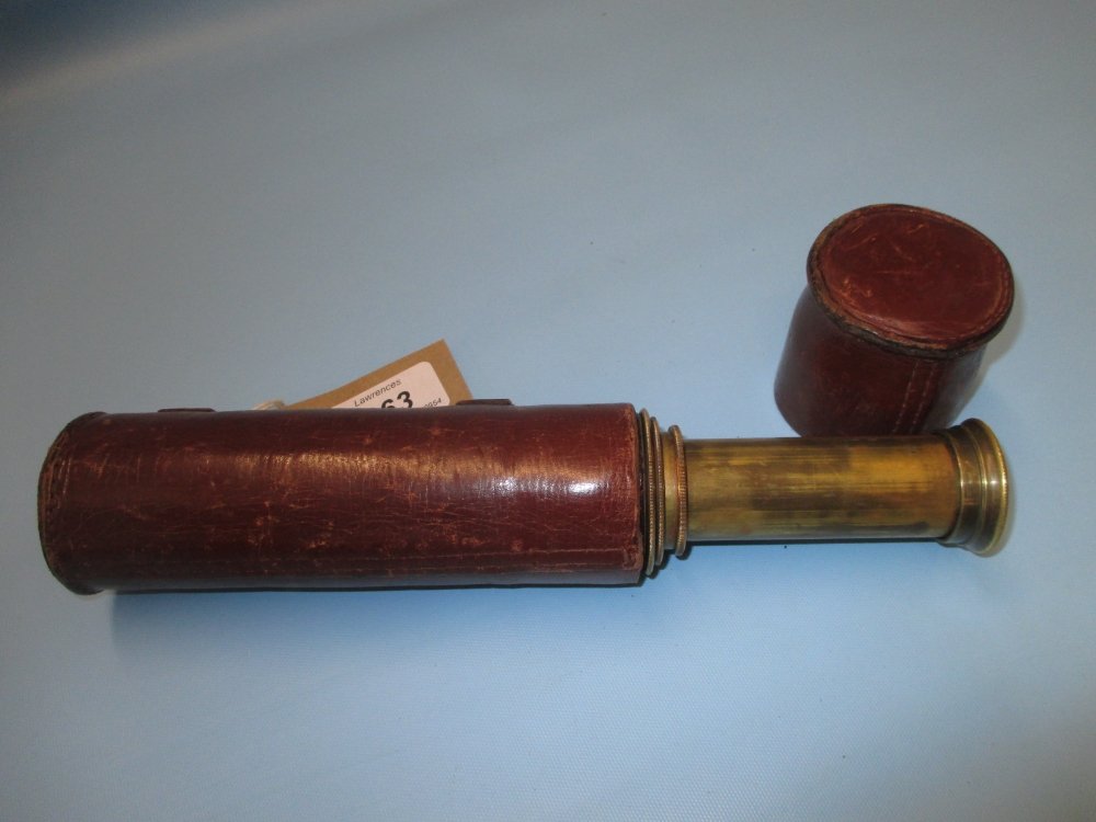 Late 19th / early 20th Century Dolland brass and: Late 19th / early 20th Century Dolland brass and leather gripped four section telescope x 15 in a leather carrying case