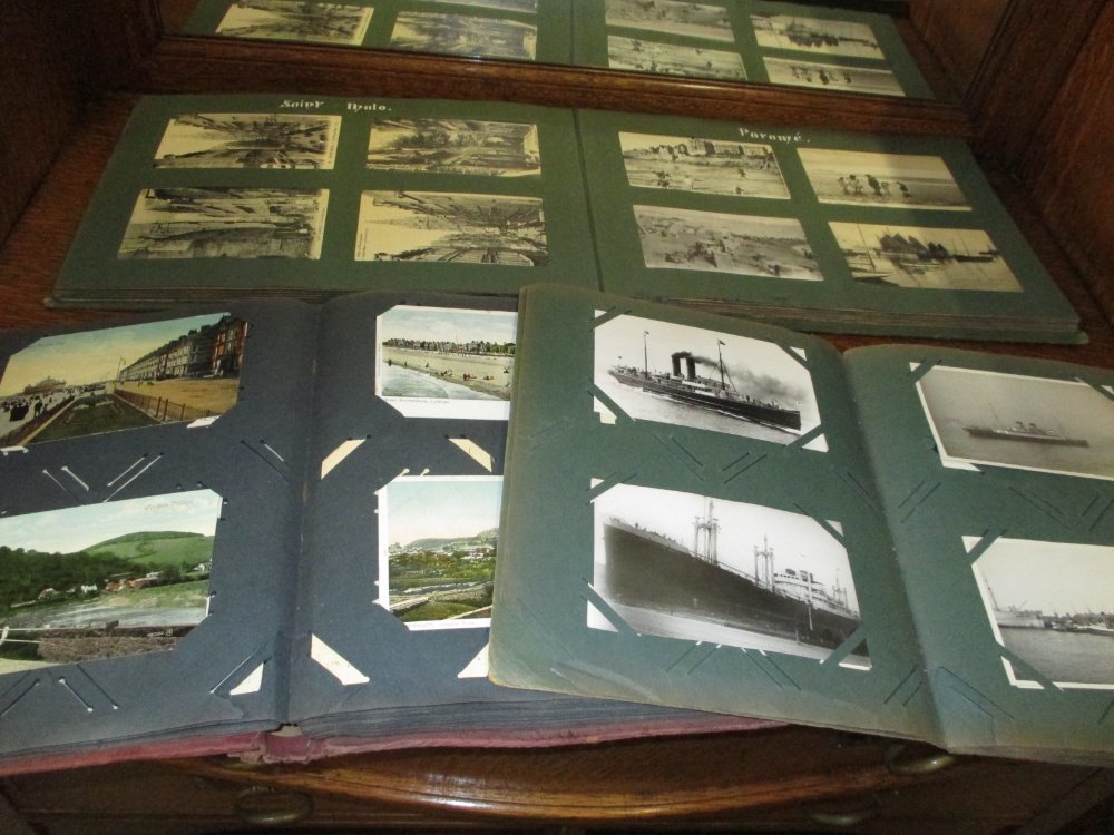 Edwardian album containing a quantity of Brittany: Edwardian album containing a quantity of Brittany cards, another album of ships and a further mixed album with approximately 300 cards