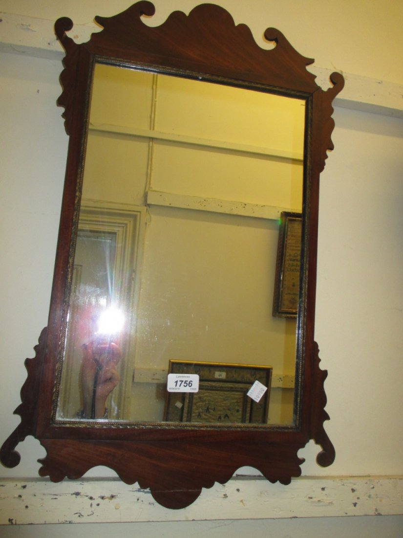 Small mahogany fretwork wall mirror and a mahogany two: Small mahogany fretwork wall mirror and a mahogany two tier bedside table