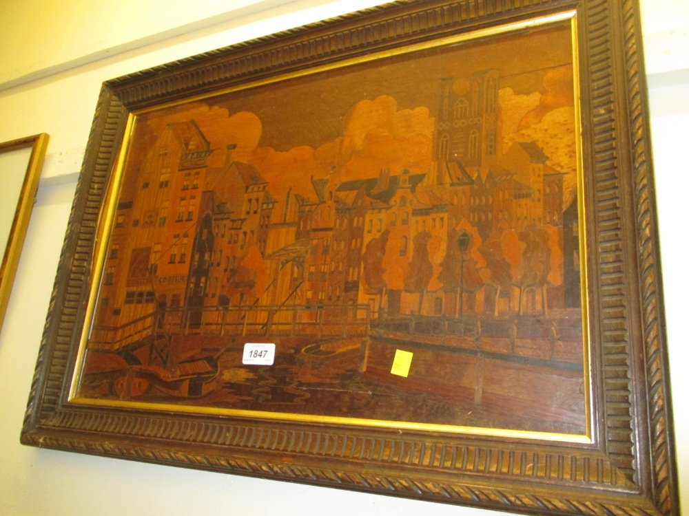 Oak framed marquetry picture of town and port scene: Oak framed marquetry picture of town and port scene with moored boats and footbridge, 18ins x 26ins