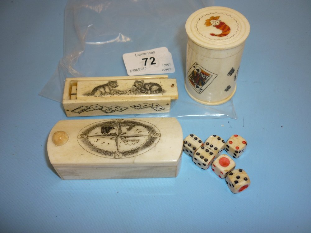 20th Century carved bone Scrimshaw work puzzle box, the: 20th Century carved bone Scrimshaw work puzzle box, the lid decorated with a compass together with a similar miniature boxed set of dominoes, the cover decorated with cats and a similar cylindrical bo