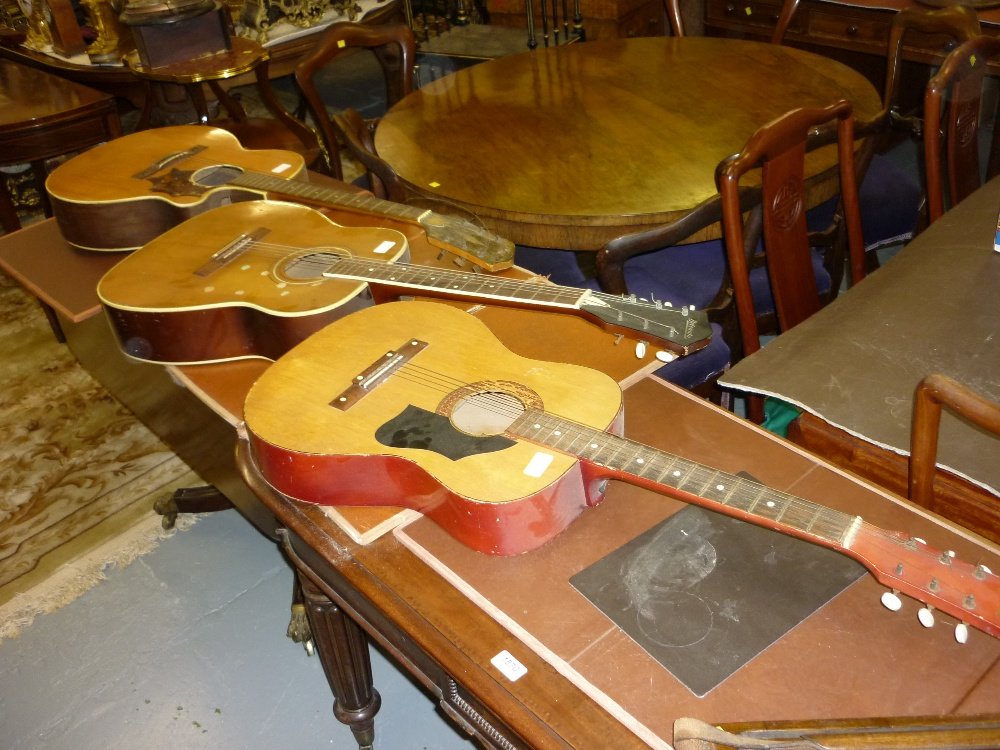 Belcanto six string acoustic guitar together with a (1 of 1)