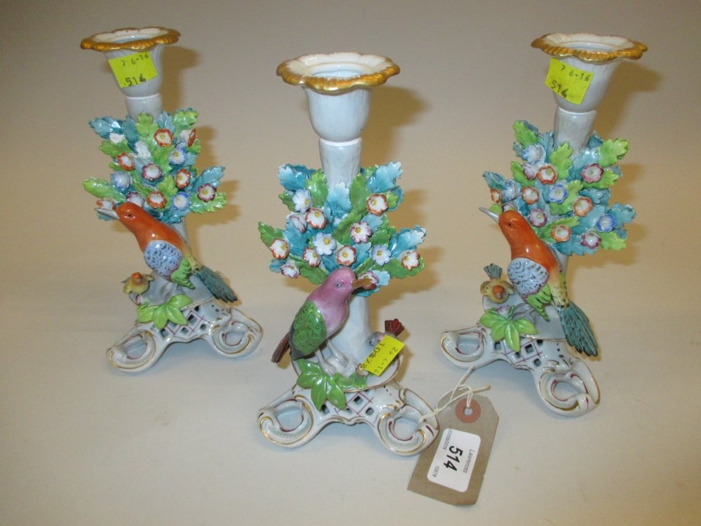 Pair of Sitzendorf porcelain candlesticks mounted with (1 of 1)