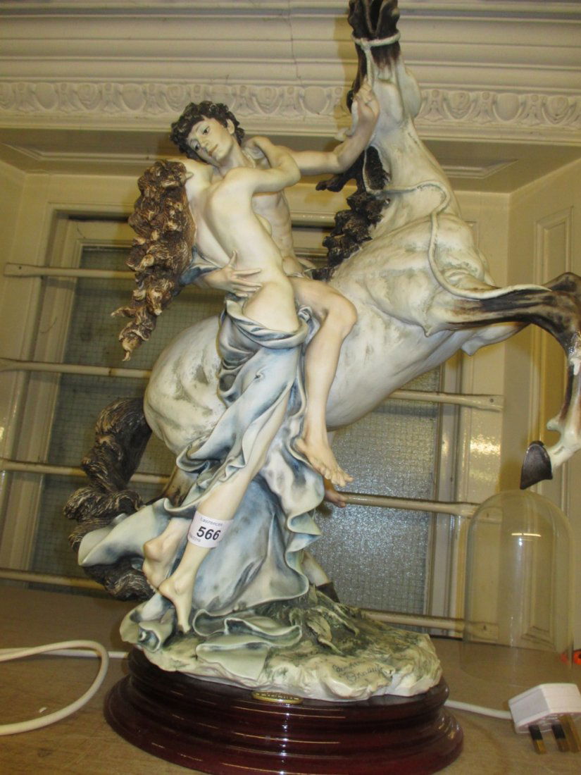 Modern moulded composition group of a couple with a (1 of 1)