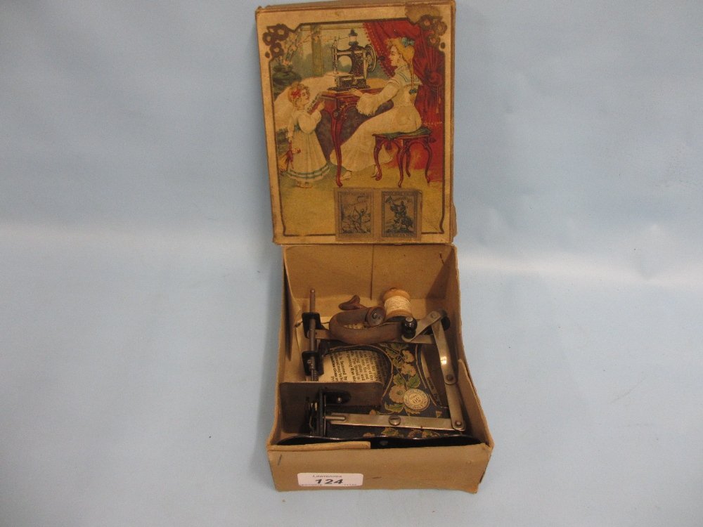 Child's boxed Edwardian tin plate sewing machine (1 of 1)