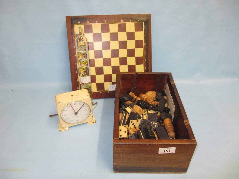 Mahogany box containing a quantity of various ebony and: Mahogany box containing a quantity of various ebony and bone dominoes, part chess sets and a chess board