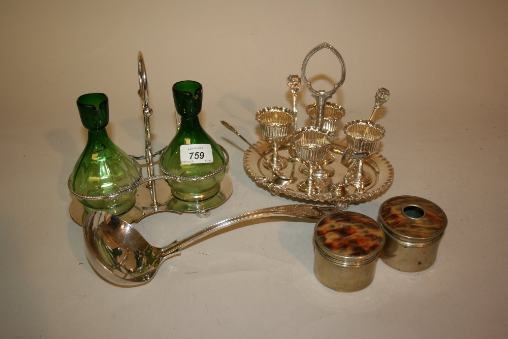 Silver plated egg cup stand, silver plated oil and: Silver plated egg cup stand, silver plated oil and vinegar stand with green glass bottles, pair of plated berry spoons, a ladle and two dressing table jars