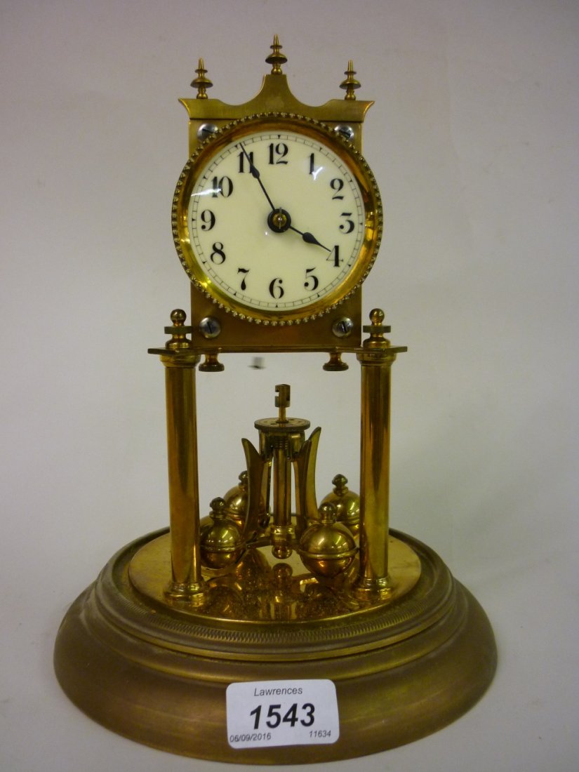 Brass anniversary clock under a glass dome including (1 of 2)
