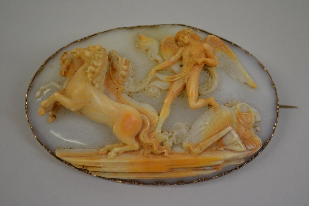 Large fine quality 19th Century shell cameo brooch,: Large fine quality 19th Century shell cameo brooch, carved in high relief with Peace halting the horses of Mars, with original green tooled leather case, the cameo approximately 70mm x 45mm