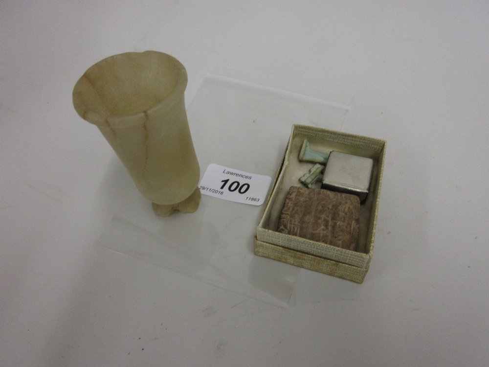 Small collection of antiquities to include: an: Small collection of antiquities to include: an alabaster footed vessel, 8cms in height (a/f), a miniature scarab, small cuneiform tablet and two other items