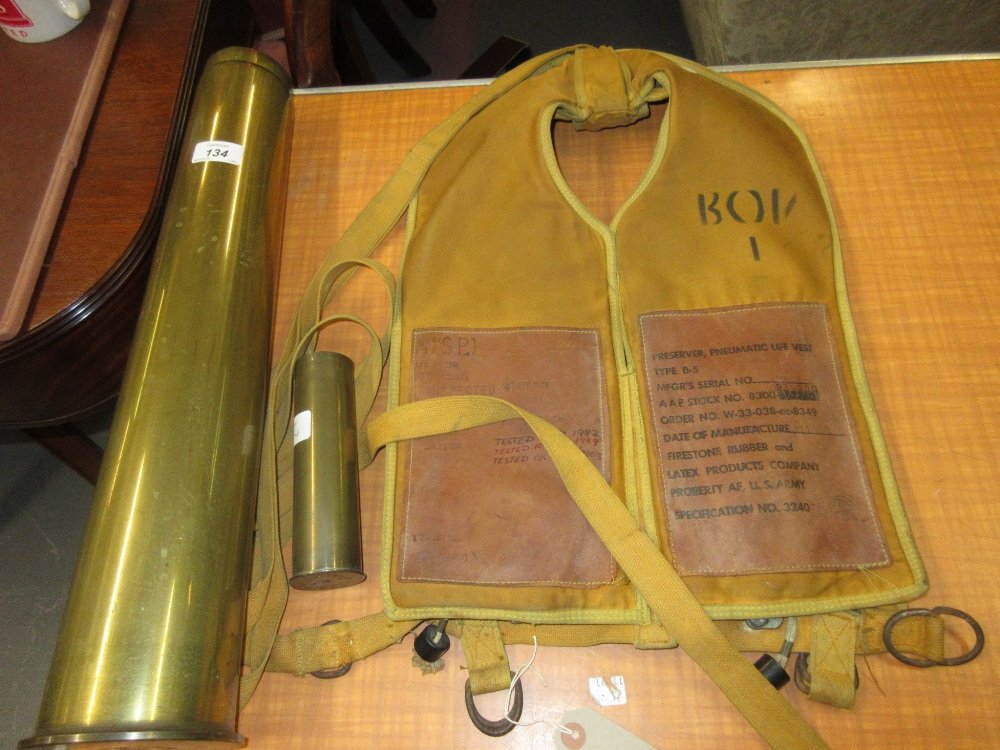 Large 76mm Vickers brass shell case, smaller shell case: Large 76mm Vickers brass shell case, smaller shell case and a 1946 ' Life Preserver Vest '