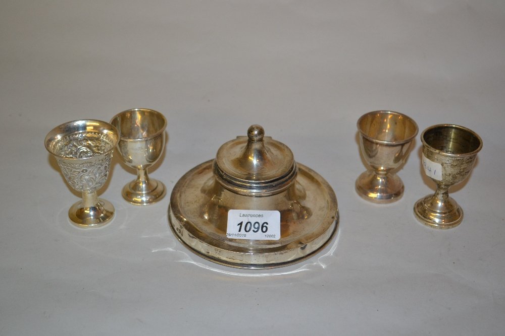 Silver capstan inkwell together with four silver egg: Silver capstan inkwell together with four silver egg cups
