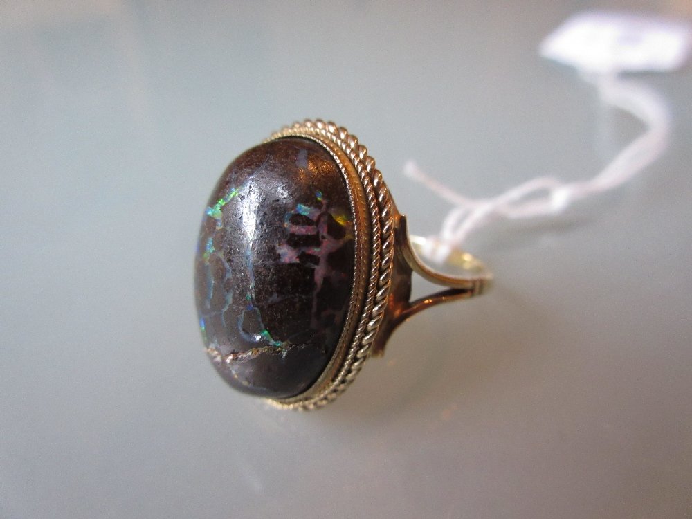 Gold ring set wood opal (1 of 1)