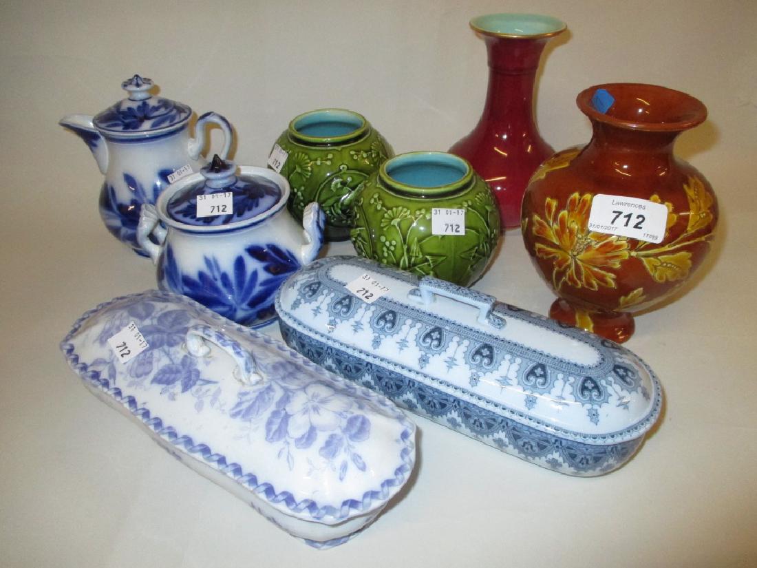 Pair of Sarreguemines green glazed and relief decorated: Pair of Sarreguemines green glazed and relief decorated miniature jardinieres, a floral decorated baluster vase, a red mottled glazed vase, two soap dishes and a blue and white cream jug and sugar bas