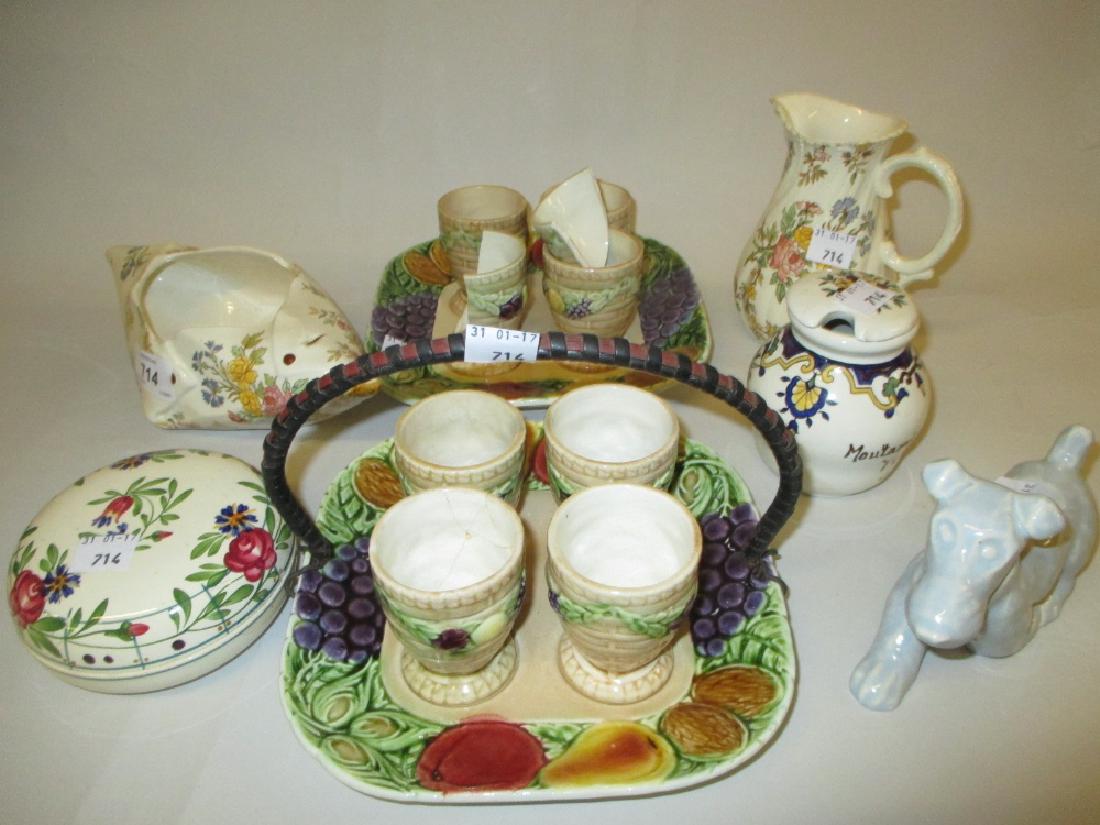 Sarreguemines floral decorated boat form vase, similar: Sarreguemines floral decorated boat form vase, similar jug, powder bowl and cover, model of a dog, mustard pot and two eggcup sets (one a/f)
