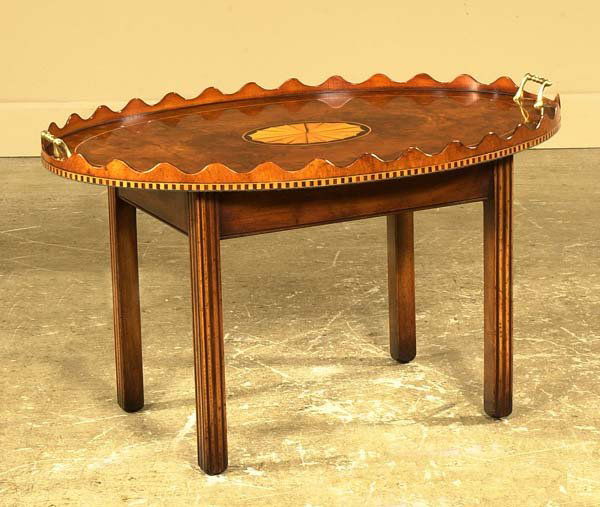 Oval Sheraton style walnut serving tray on a stra: Oval Sheraton style walnut serving tray on a straight leg stand, 34" wide, 24" deep, 20" high