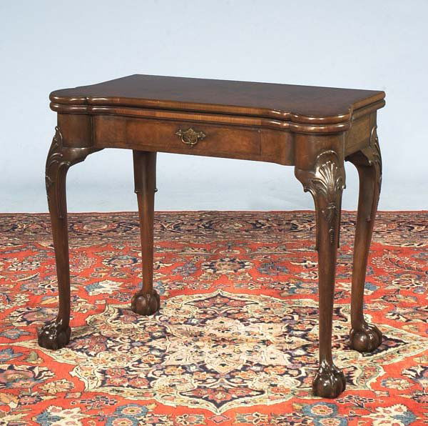 Chippendale walnut lift top game table on cabriol: Chippendale walnut lift top game table on cabriole legs with shell carved knees and ball and claw feet, c1890, 35" wide, 17" deep, 29" high
