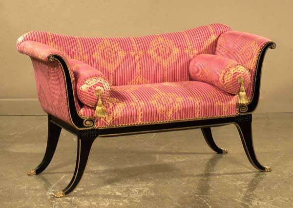 Black lacquered Duncan Phyfe settee with roll ove: Black lacquered Duncan Phyfe settee with roll over arms and splay legs, c1900, 53" wide, 22" deep, 32" high