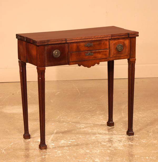 Sheraton mahogany lift top game table on tapered m: Sheraton mahogany lift top game table on tapered molded legs with Marlboro feet, c.1830, As Found (legs need some repairs), 30" wide, 15" deep, 29" high