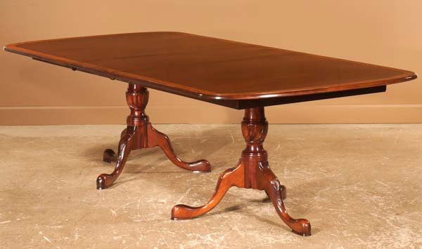 Two pedestal Queen Anne style mahogany dining tabl: Two pedestal Queen Anne style mahogany dining table with burl walnut banded top and two leaves, 80" long, 48" wide, 29" high, each leaf 16" deep