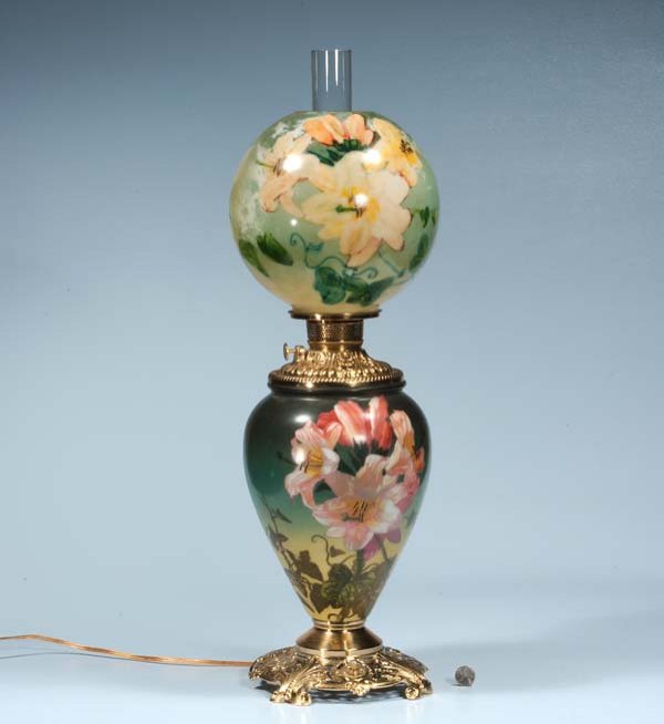 American Gone with the Wind lamp with floral decor: American Gone with the Wind lamp with floral decoration and brass mounts, c.1890, 30" high