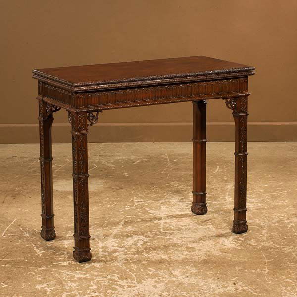 Chippendale mahogany lift top game table on molded: Chippendale mahogany lift top game table on molded and carved legs and Marlboro feet, 36" wide, 18" deep, 31" high