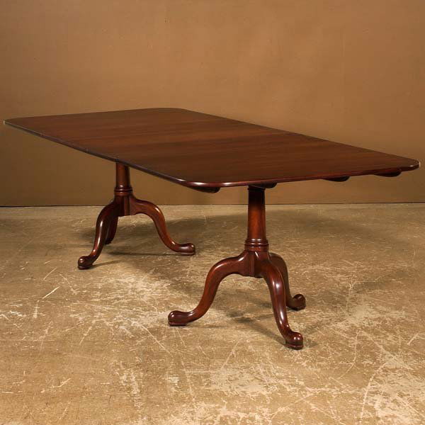 Two pedestal queen Anne style mahogany dining tab: Two pedestal queen Anne style mahogany dining table with three leaves, Virginia Galleries Furniture by Henkel Harris, 66" long, 44" wide, 30" high, leaves 14" deep each
