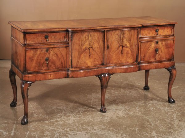 Queen Anne walnut shaped front hunt board with cr