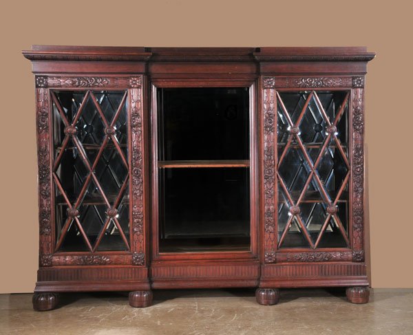 English oak breakfront bookcase with carved diamo