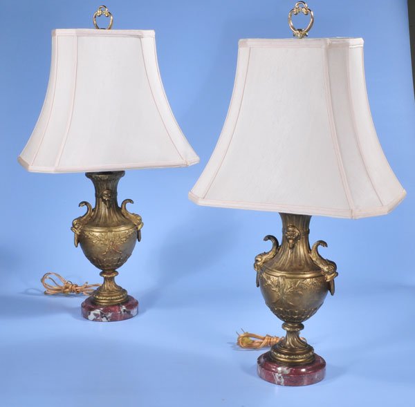 Pair of gilt spelter urn shaped lamps with marble