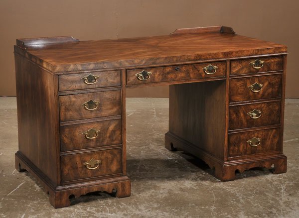 Chippendale style fruitwood pedestal desk on bra