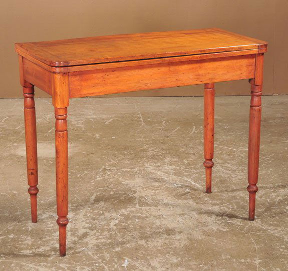 Sheraton mahogany lift top game table on turned leg: Sheraton mahogany lift top game table on turned legs, c.1840, 36" wide, 18" deep, 29" high