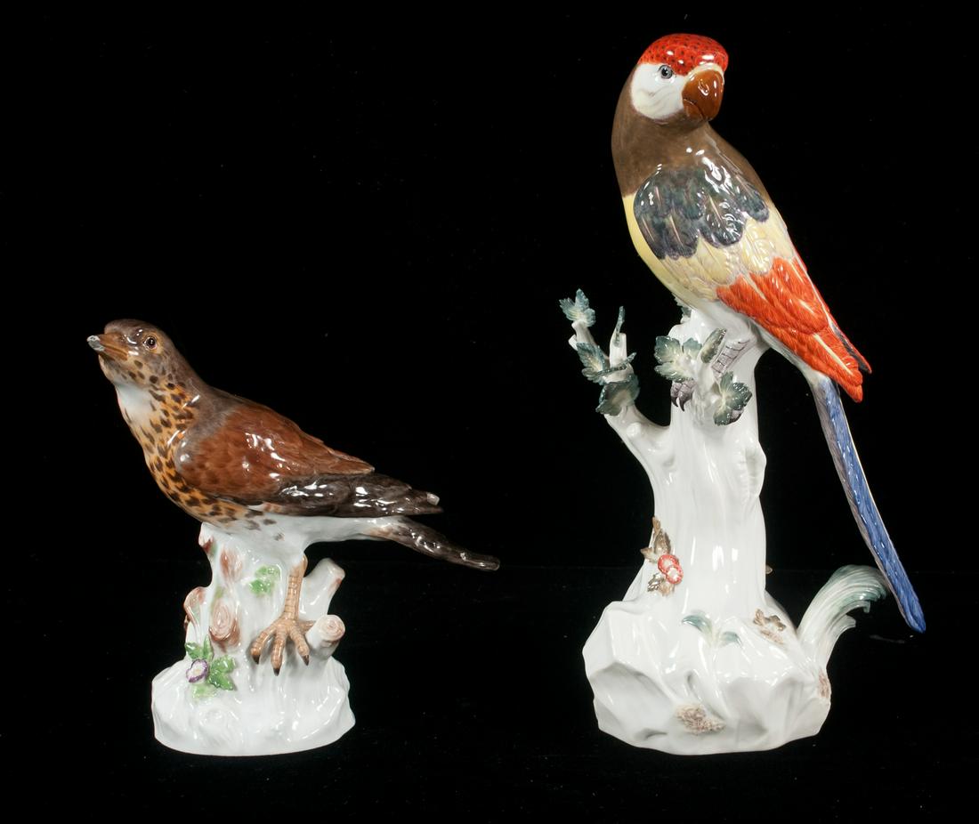 Two Meissen birds: Meissen porcelain figure of a multi color parrot perched in a tree, 13" high, along with a Meissen porcelain figure of a bird perched on a limb, 8" high (AF small chip to beak), 2 pieces